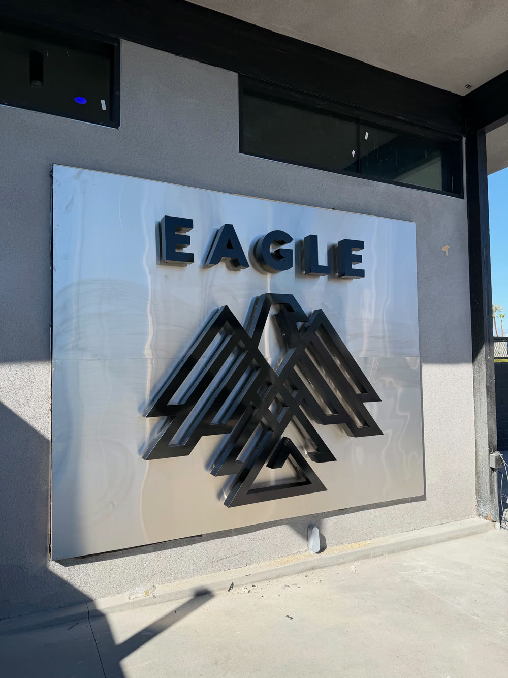 The Eagle logo on the entrance wall of Eagle Cathedral City